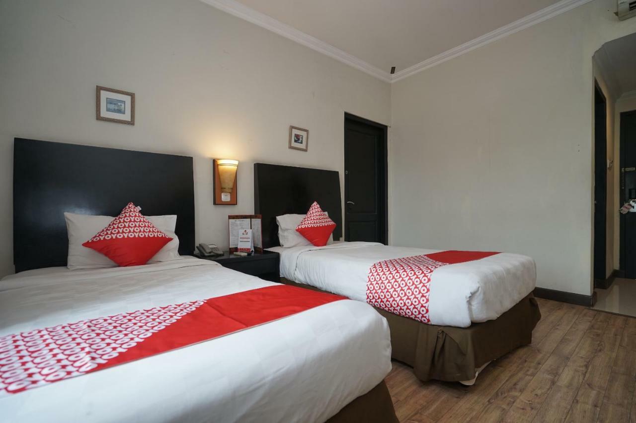 Capital O 1128 Hotel Imara Palembang Extérieur photo