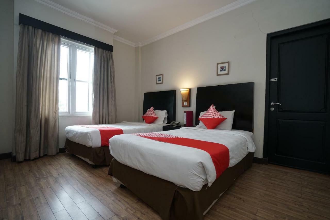 Capital O 1128 Hotel Imara Palembang Extérieur photo