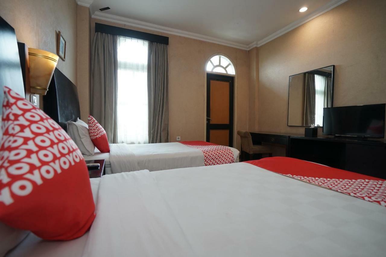 Capital O 1128 Hotel Imara Palembang Extérieur photo