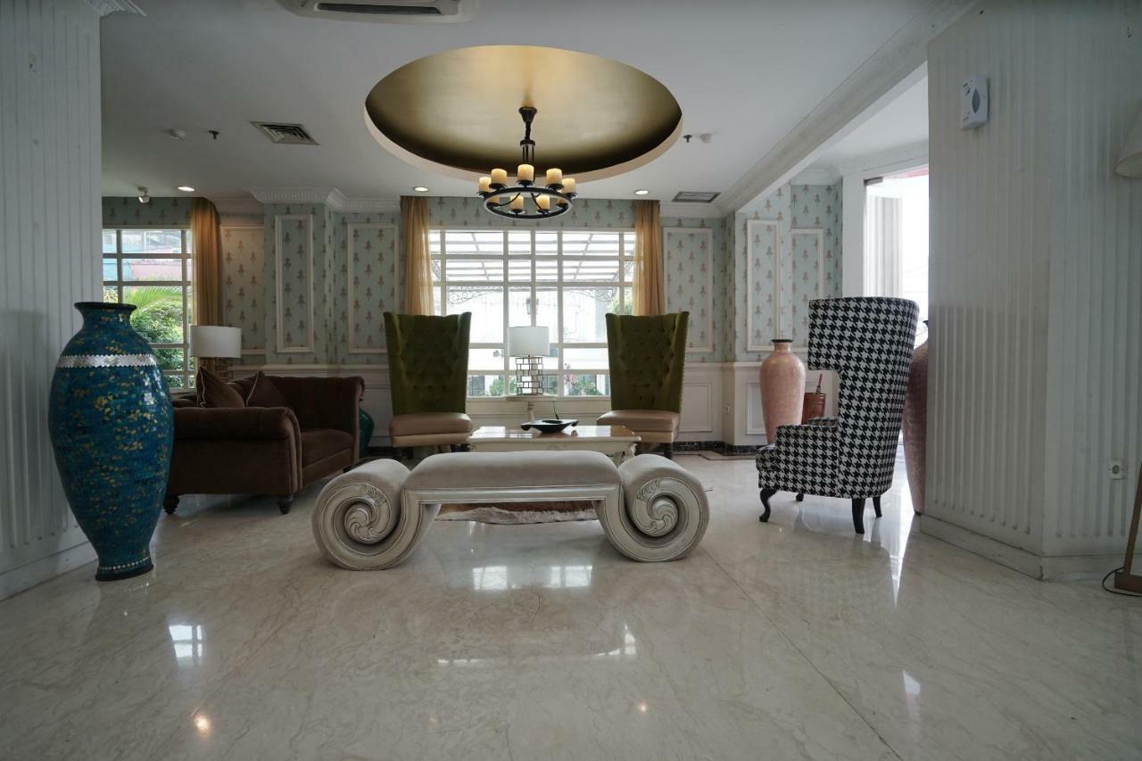 Capital O 1128 Hotel Imara Palembang Extérieur photo
