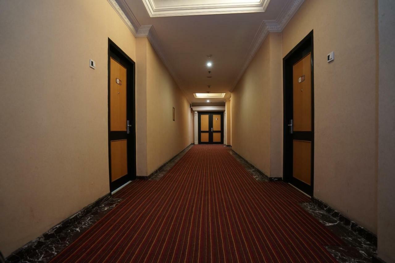 Capital O 1128 Hotel Imara Palembang Extérieur photo