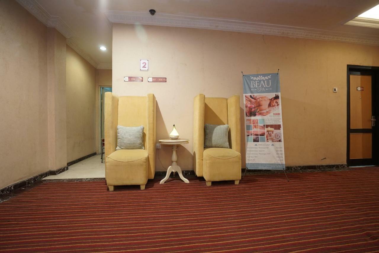Capital O 1128 Hotel Imara Palembang Extérieur photo