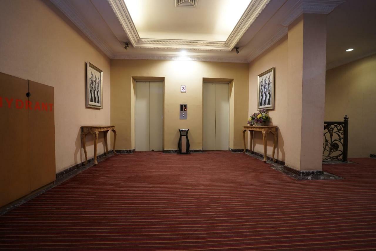 Capital O 1128 Hotel Imara Palembang Extérieur photo