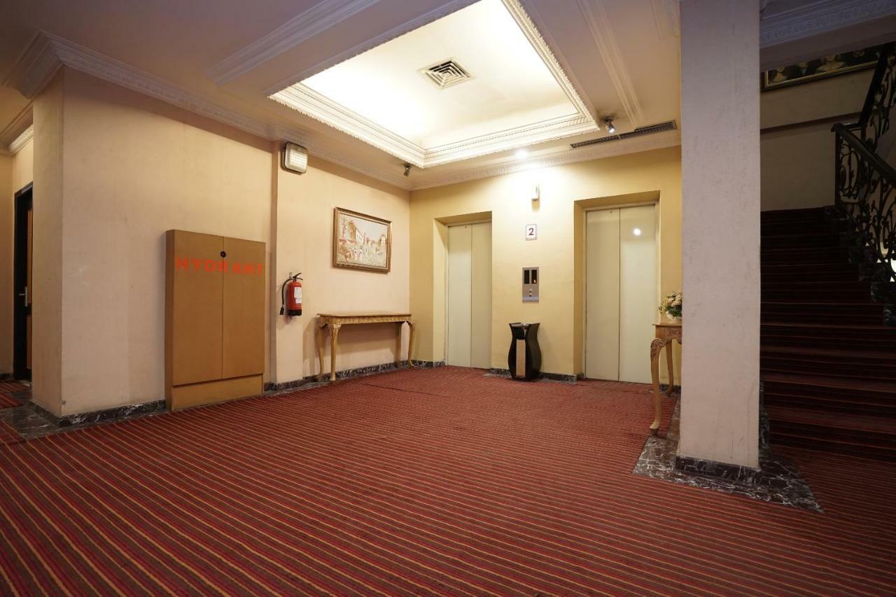 Capital O 1128 Hotel Imara Palembang Extérieur photo